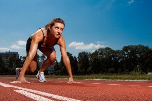 bigstock-Athletic-woman-on-track-starti-19463825